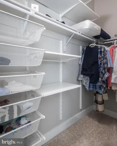 a view of roof deck with seating space and barbeque oven