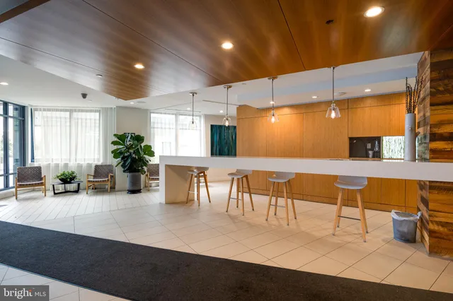 a view of a building with sitting area