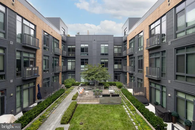 a view of a terrace with sitting area