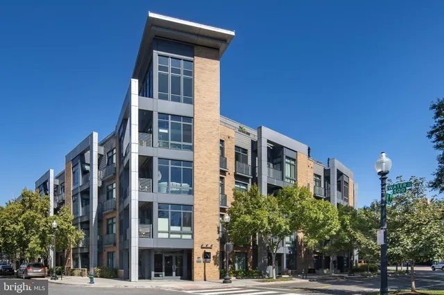 a view of a building with sitting area
