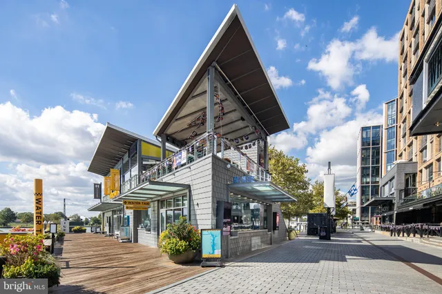 a view of a building with sitting area