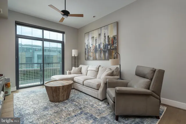 a view of a storage and utility room with washer and dryer