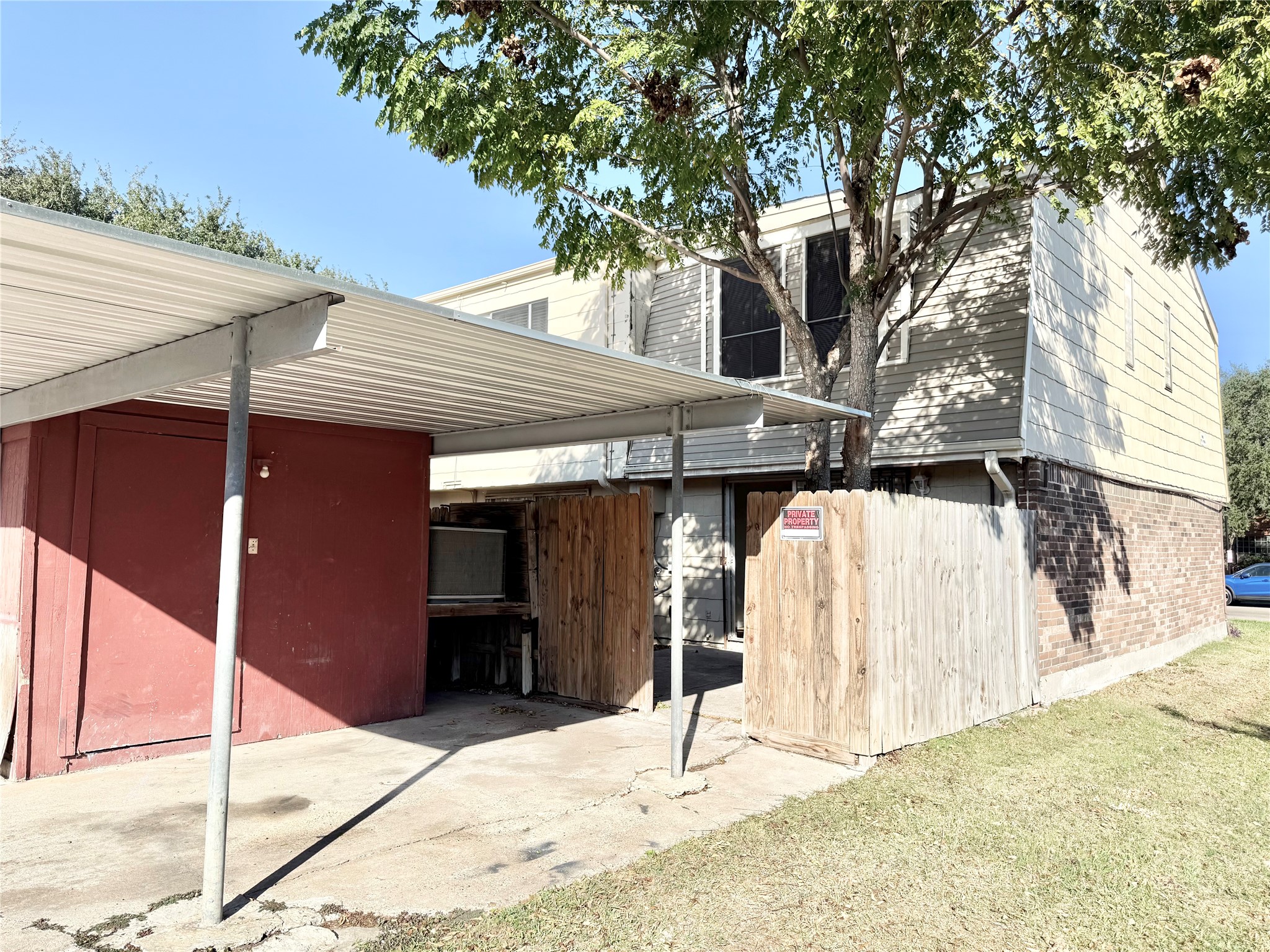7980 Grove Ridge Drive Houston, TX 77061 - Photo 19 of 19 Covered Carport with exterior Storage room