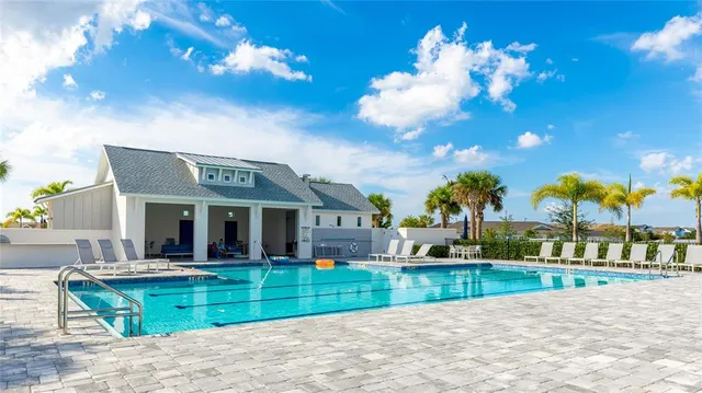 a view of a park with iron fence