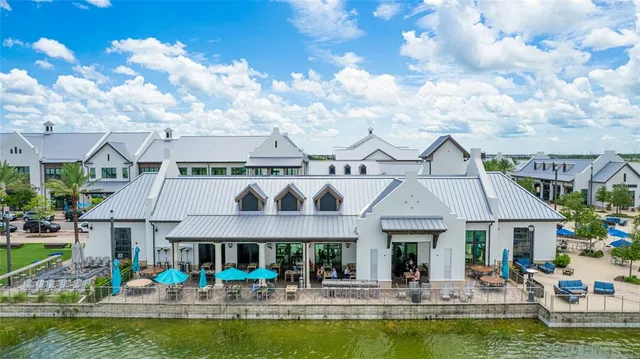 a view of a dinning table and chairs in patio