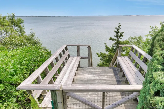 a view of balcony with wooden floor and outdoor space