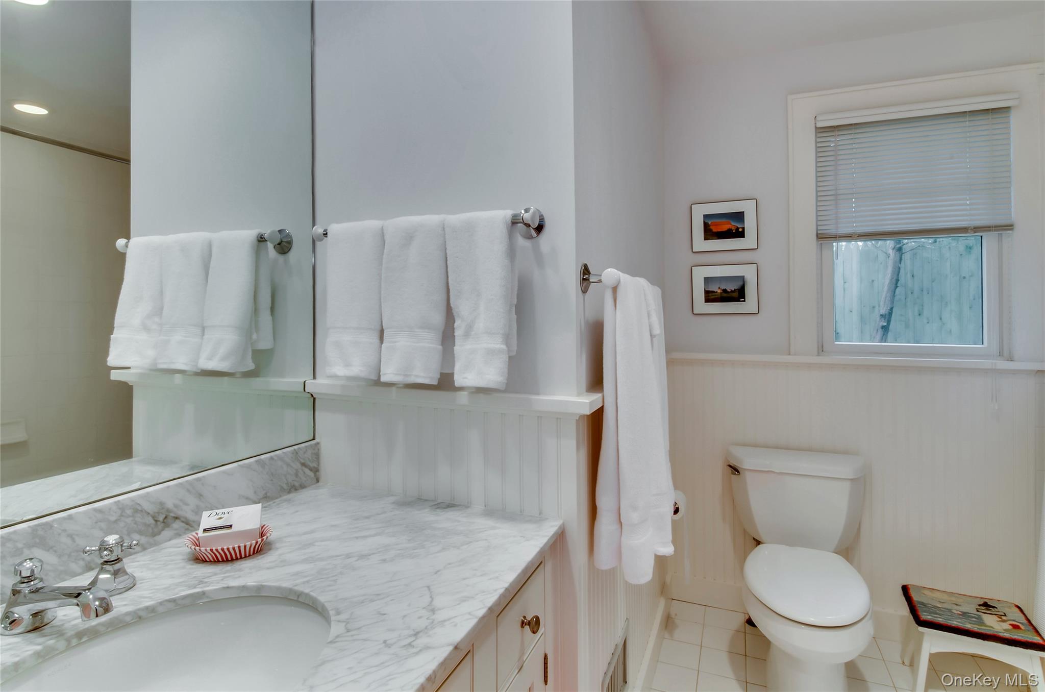 4705 Nassau Point Road Cutchogue, NY 11935 - Photo 9 of 26 a bathroom with a granite countertop sink and a toilet