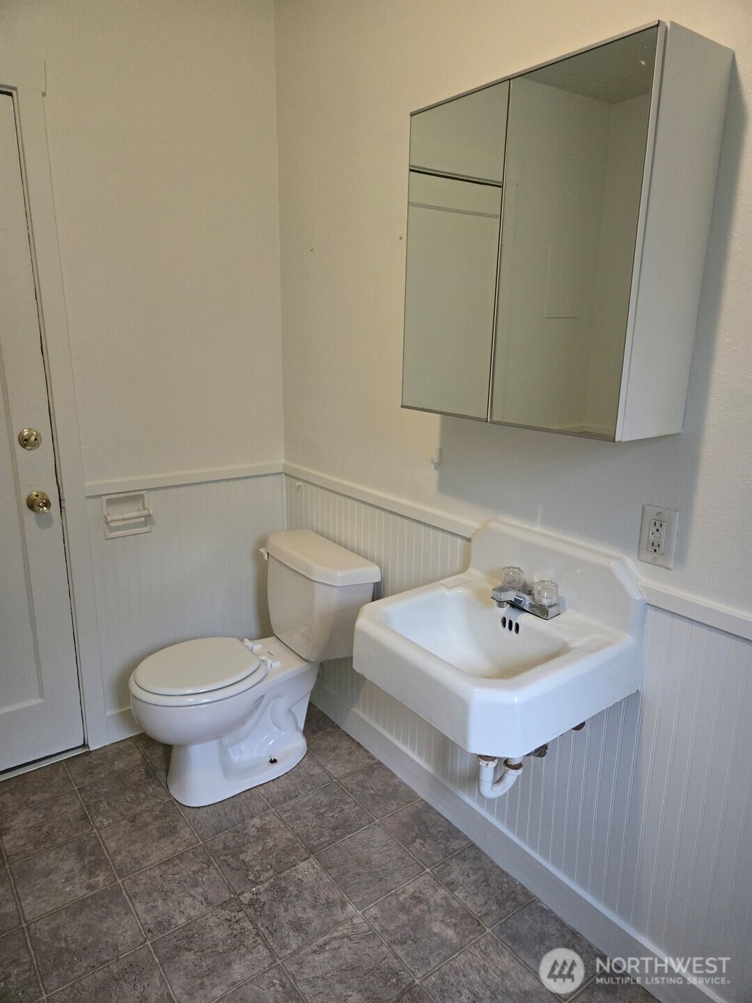 224 116th Street South Tacoma, WA 98444 - Photo 19 of 26 a bathroom with a sink toilet and mirror