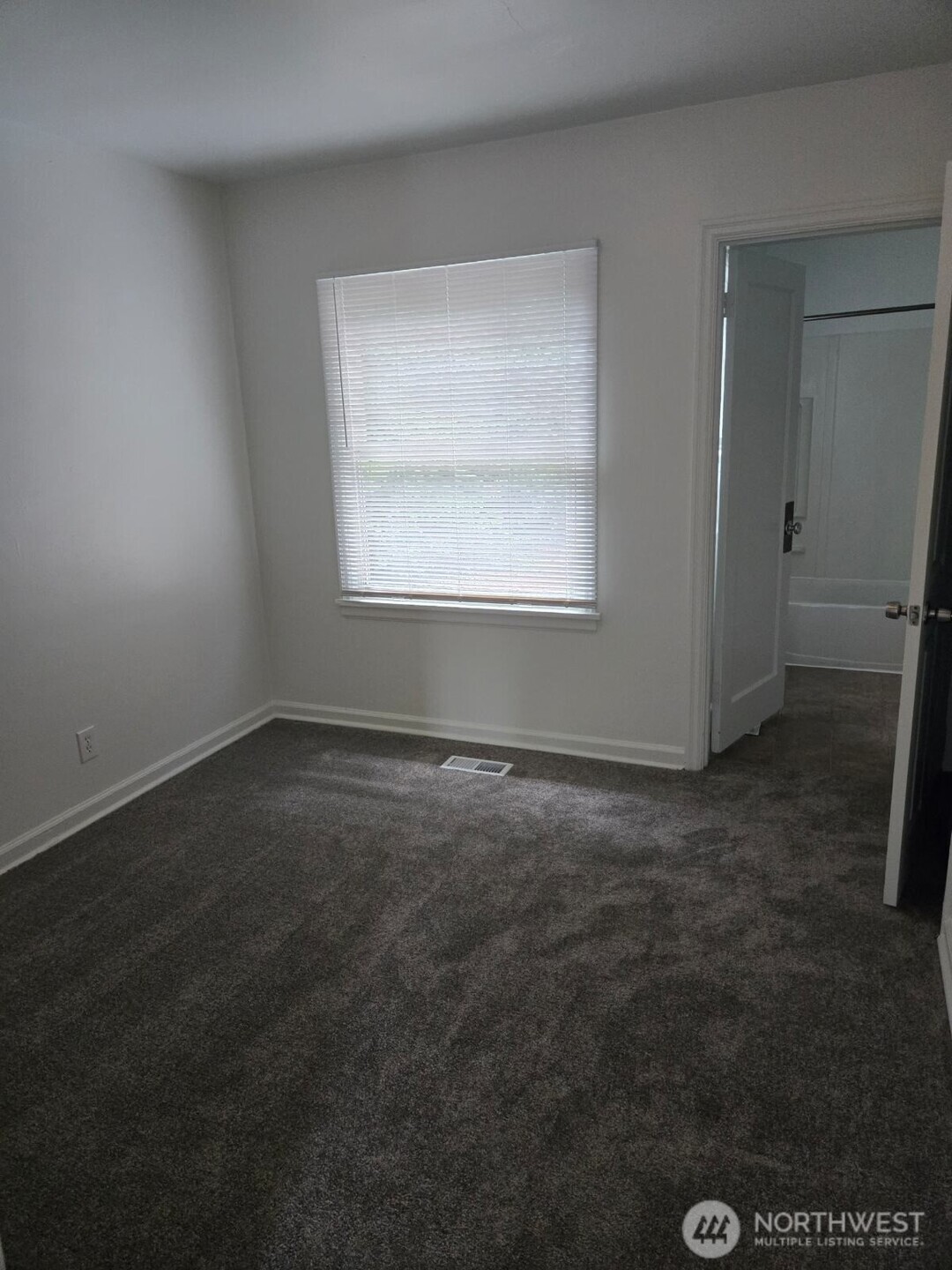 224 116th Street South Tacoma, WA 98444 - Photo 23 of 26 an empty room with a window