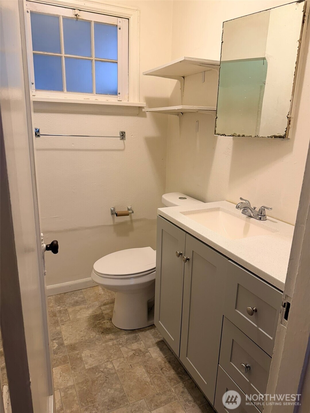 224 116th Street South Tacoma, WA 98444 - Photo 5 of 26 a bathroom with a sink a toilet and shower