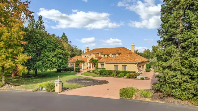 a work room with furniture and a large mirror