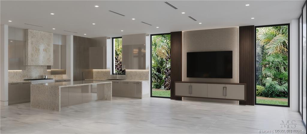 2421 Bahia Way Stuart, FL 34996 - Photo 13 of 63 a large kitchen with stainless steel appliances a large counter top