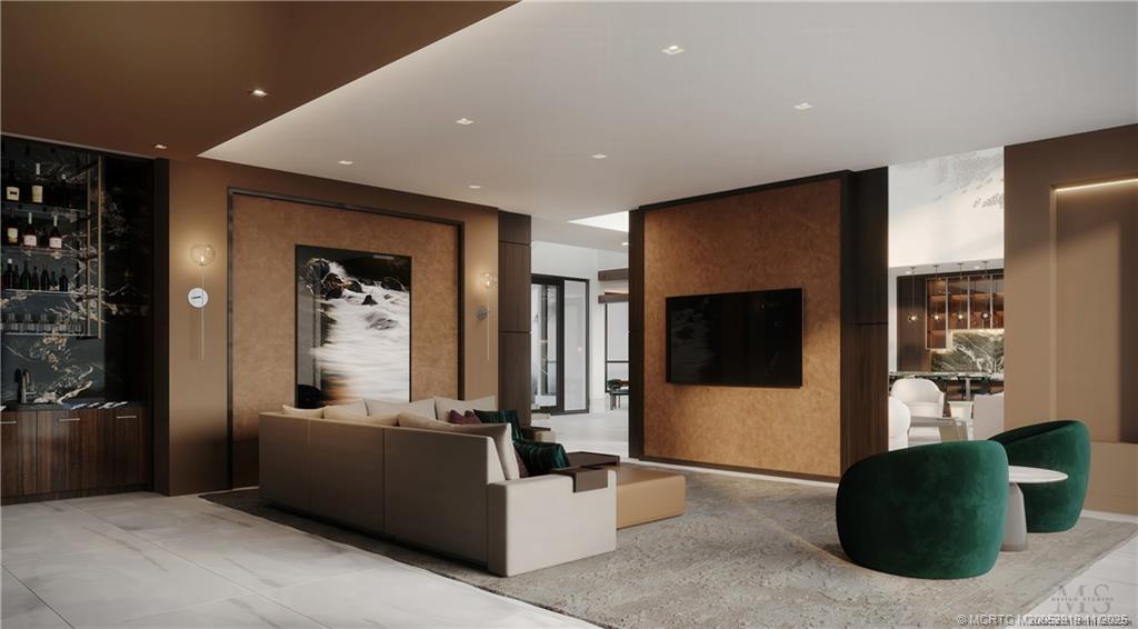 2421 Bahia Way Stuart, FL 34996 - Photo 18 of 63 a living room with furniture and a flat screen tv