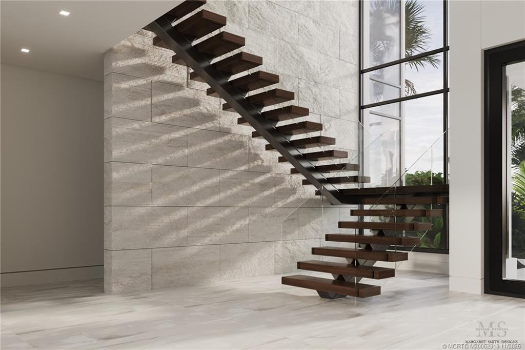 2421 Bahia Way Stuart, FL 34996 - Photo 28 of 63 a view of entryway with wooden floor