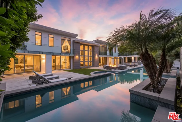 a front view of a house with swimming pool