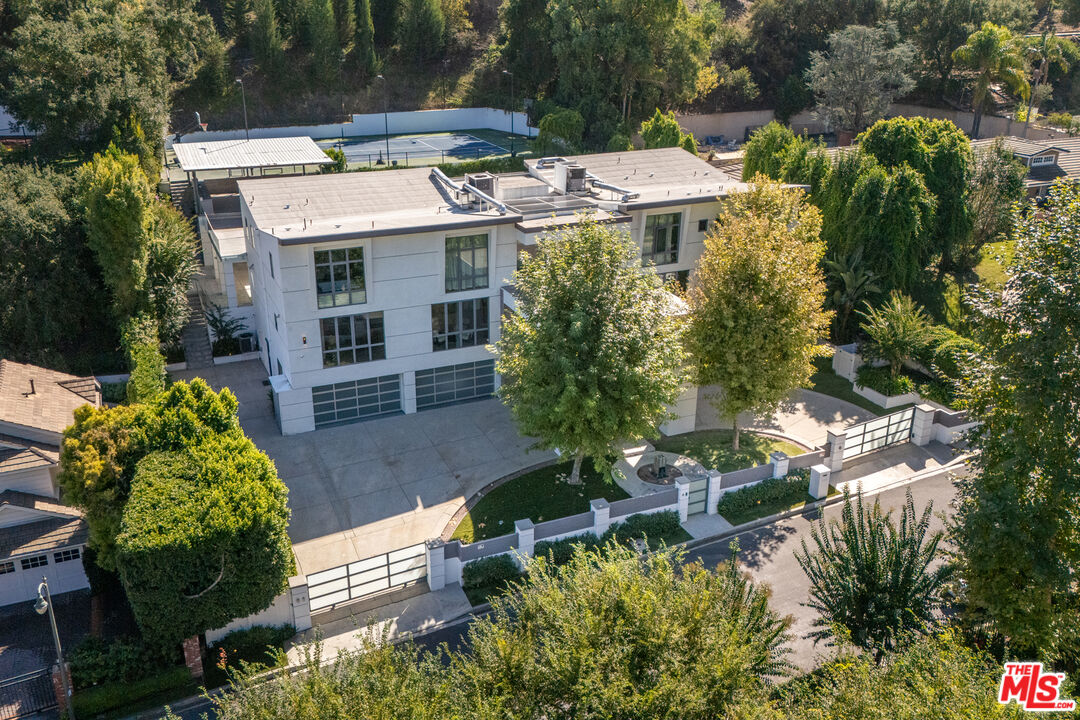 4230 Valley Meadow Road Encino, CA 91436 - Photo 2 of 44 an aerial view of a house with garden space and sitting area