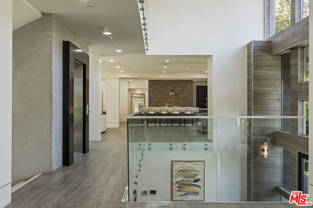 4230 Valley Meadow Road Encino, CA 91436 - Photo 23 of 44 a bathroom with a sink and a mirror