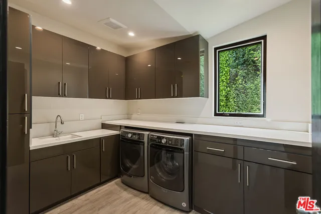 a kitchen with a sink and a window