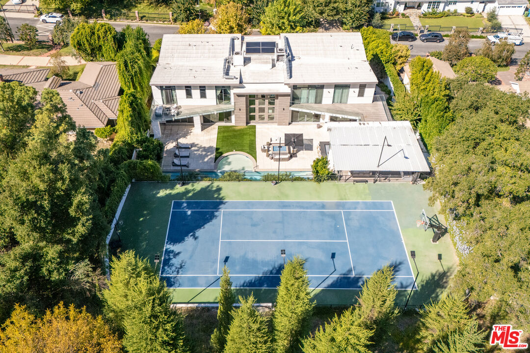 4230 Valley Meadow Road Encino, CA 91436 - Photo 40 of 44 an aerial view of residential houses with outdoor space and swimming pool
