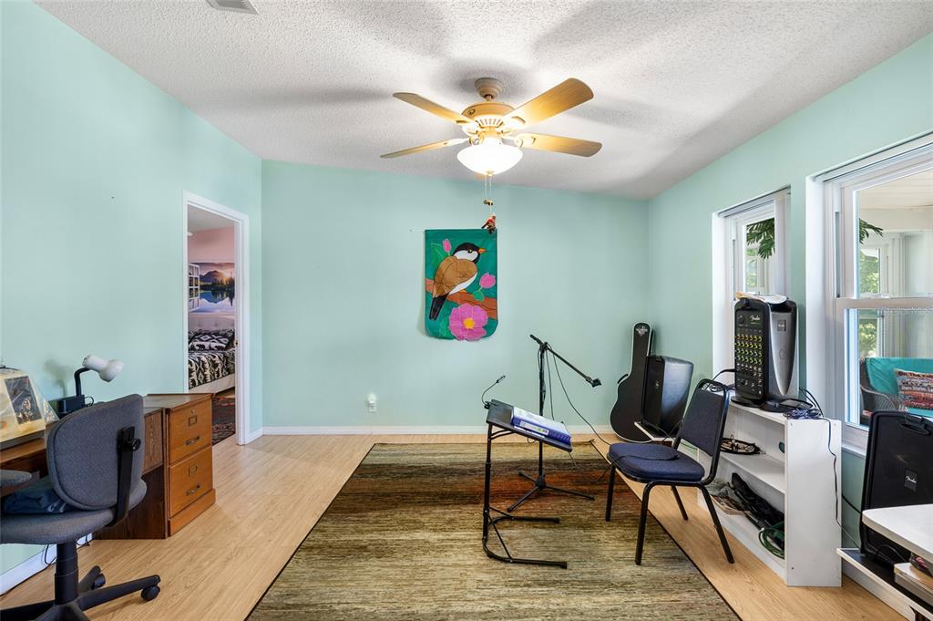 6333 Bear Trail Weeki Wachee, FL 34607 - Photo 33 of 52 a workspace with wooden floor