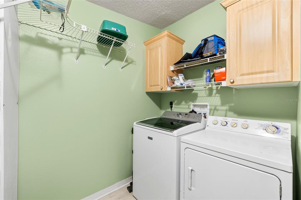 6333 Bear Trail Weeki Wachee, FL 34607 - Photo 35 of 52 a utility room with dryer and washer