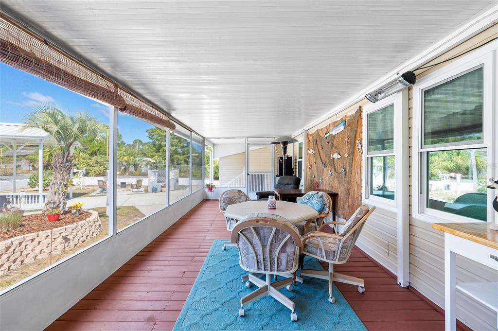6333 Bear Trail Weeki Wachee, FL 34607 - Photo 36 of 52 a dining room with furniture water view and wooden floor