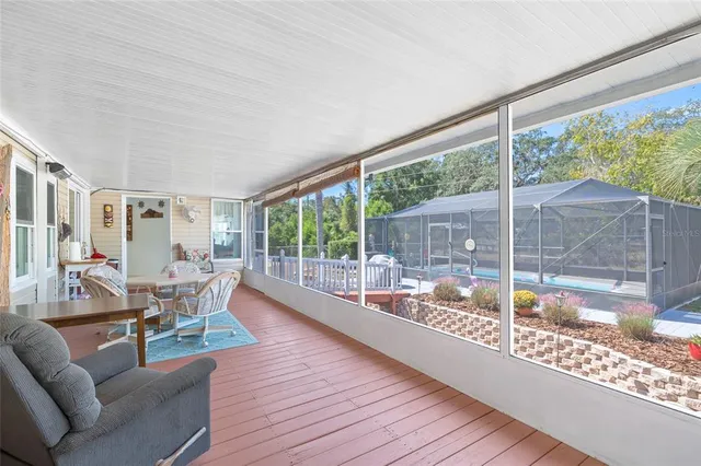 a view of yard with a patio