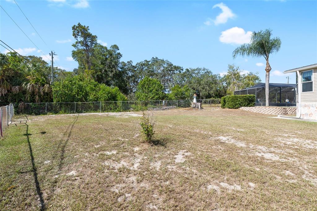 6333 Bear Trail Weeki Wachee, FL 34607 - Photo 44 of 52 a view of backyard with green space