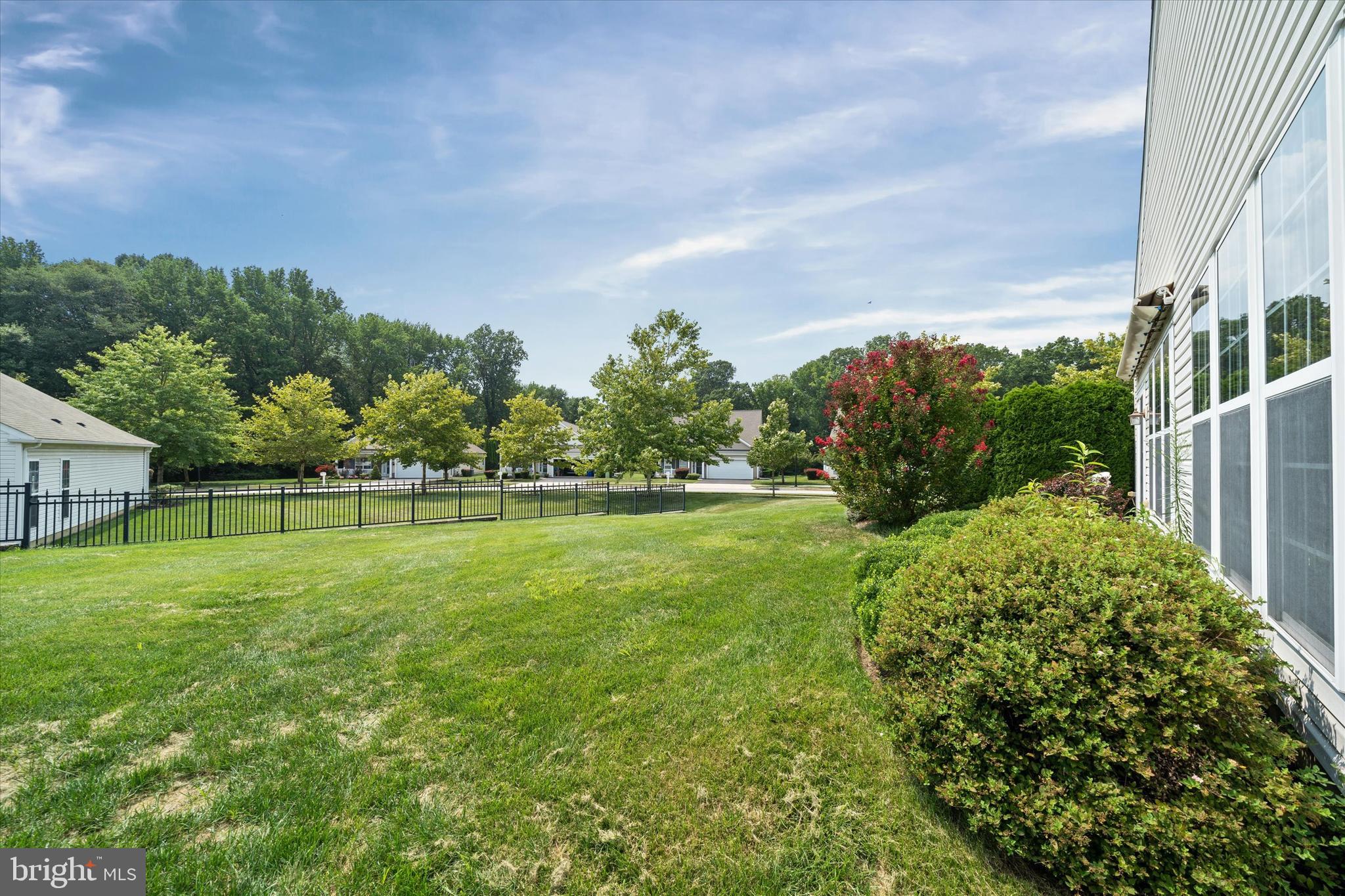 4 Compass Rose Way Newark, DE 19702 - Photo 26 of 28 a view of a big yard with plants and large trees