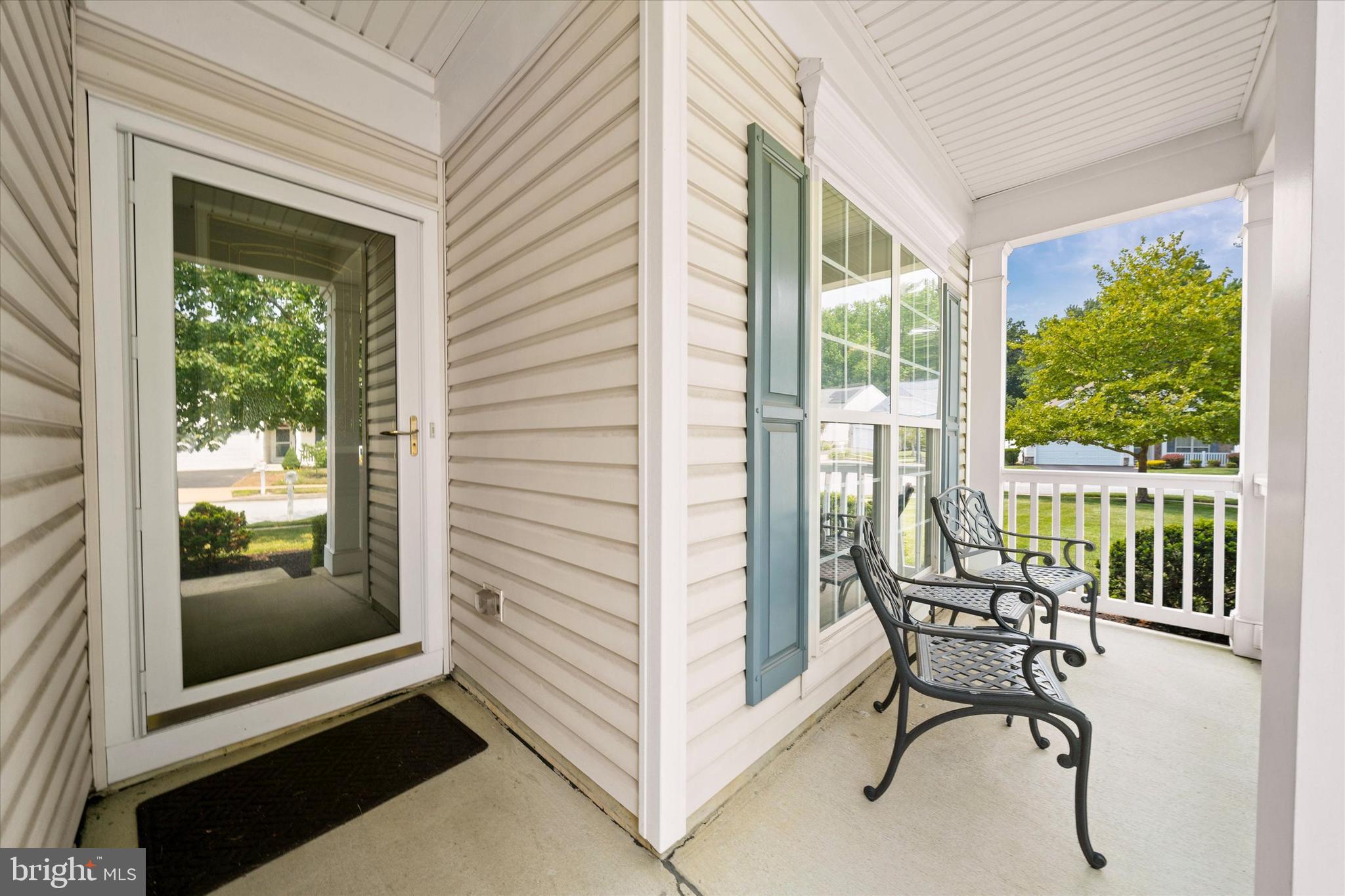 4 Compass Rose Way Newark, DE 19702 - Photo 3 of 28 a view of a balcony with furniture and a gate