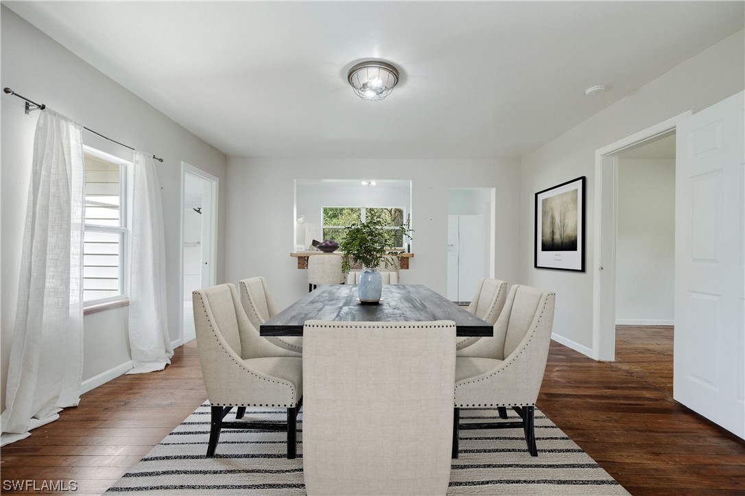2701 Packinghouse Road Alva, FL 33920 - Photo 11 of 33 a dining room with furniture and wooden floor