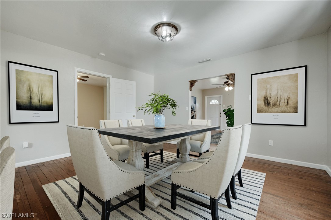 2701 Packinghouse Road Alva, FL 33920 - Photo 12 of 33 a view of a dining room with furniture and wooden floor