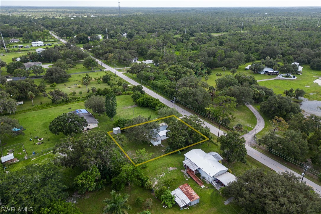 2701 Packinghouse Road Alva, FL 33920 - Photo 30 of 33 an aerial view of a house with a yard