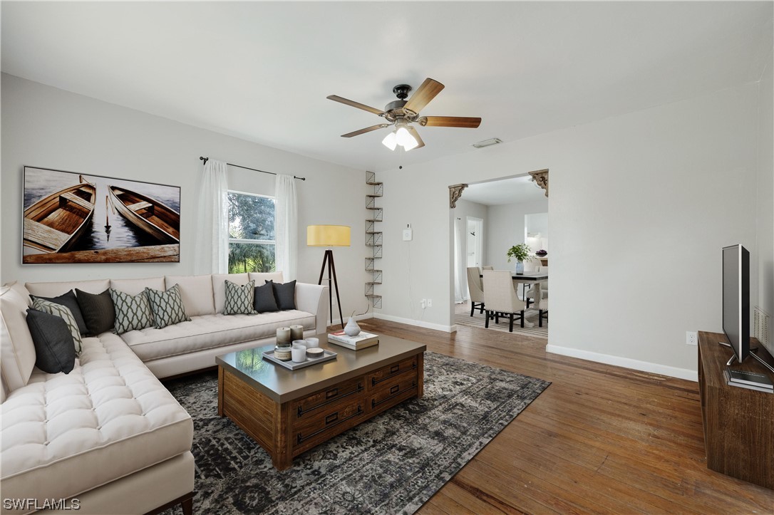 2701 Packinghouse Road Alva, FL 33920 - Photo 3 of 33 a living room with furniture and wooden floor
