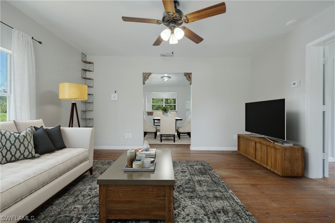 2701 Packinghouse Road Alva, FL 33920 - Photo 5 of 33 a living room with furniture and a flat screen tv