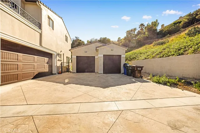 a living room with lots of furniture and a flat screen tv