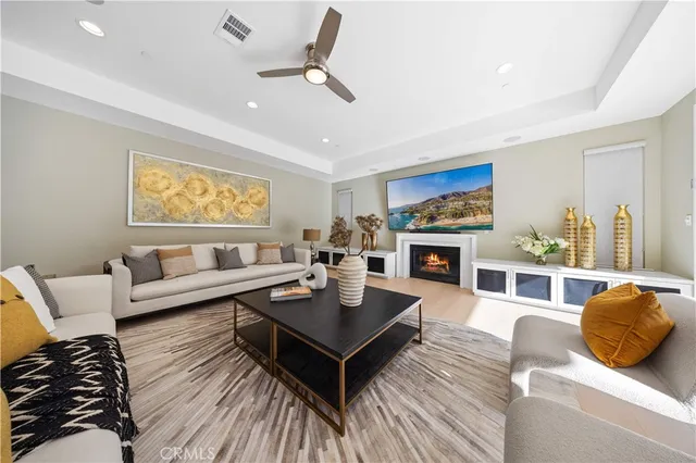 a bathroom with a double vanity sink a mirror and a bathtub