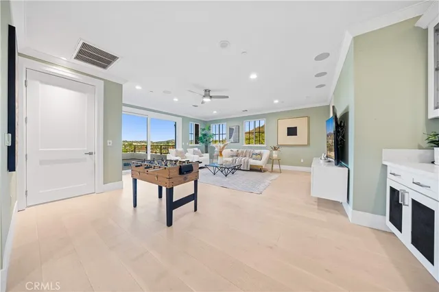 a living room with furniture and window