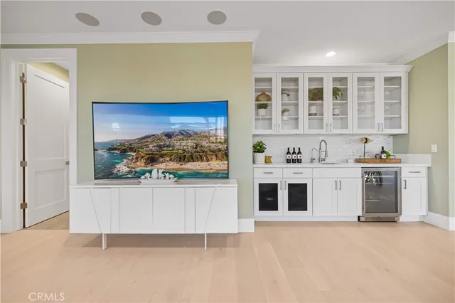 a spacious bedroom with a bed and a couch