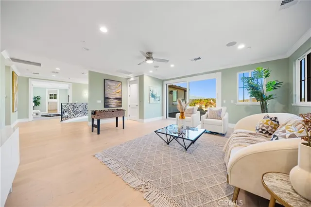 a white bath tub sitting next to a white toilet
