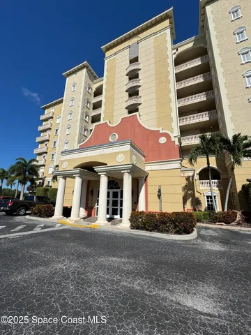 a view of a building with a street