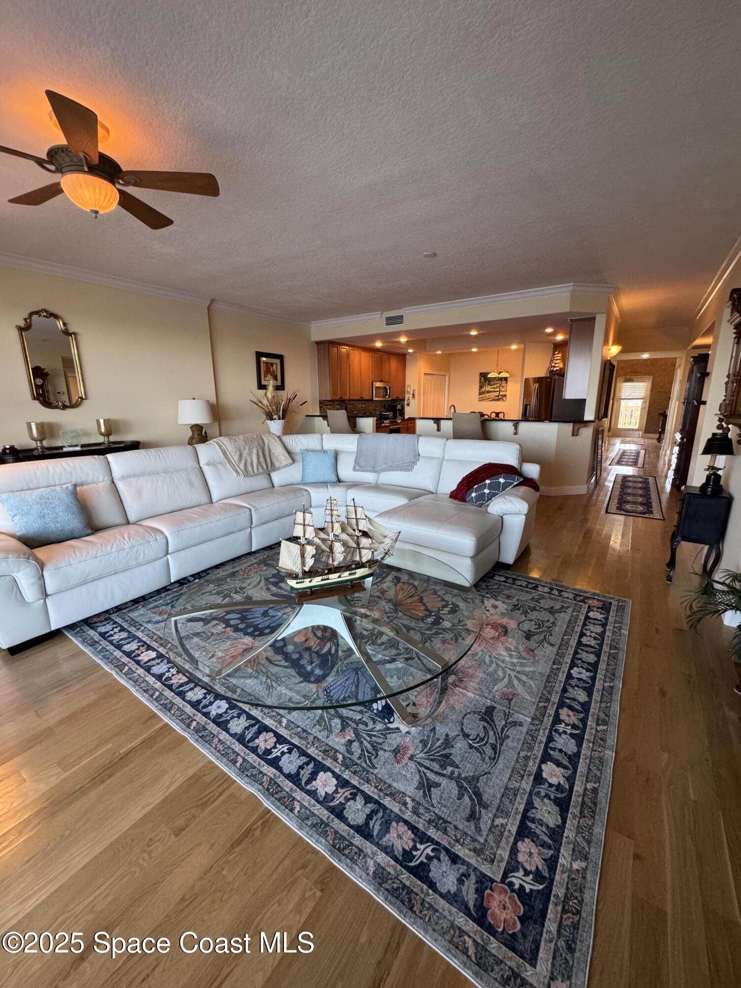 4955 Dixie Highway Northeast, Unit 502 Palm Bay, FL 32905 - Photo 13 of 51 a living room with furniture and a rug