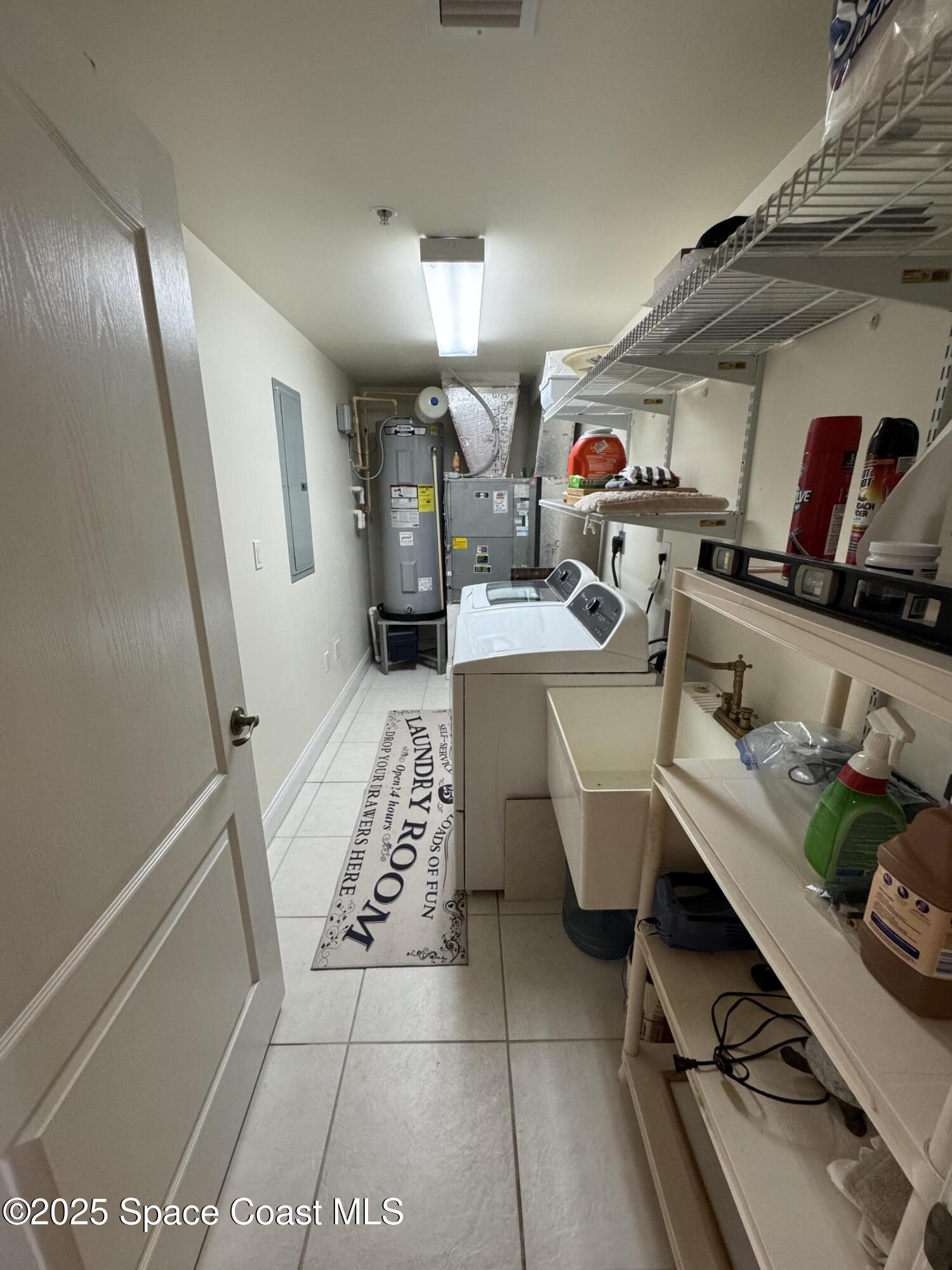 4955 Dixie Highway Northeast, Unit 502 Palm Bay, FL 32905 - Photo 23 of 51 a room with storage and utility