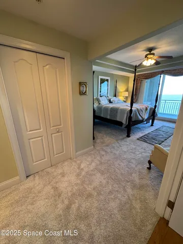 a bedroom with furniture and a dresser