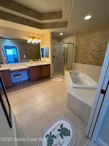 a bathroom with a toilet and a tub