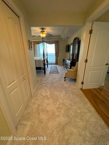 a view of a hallway with a workspace