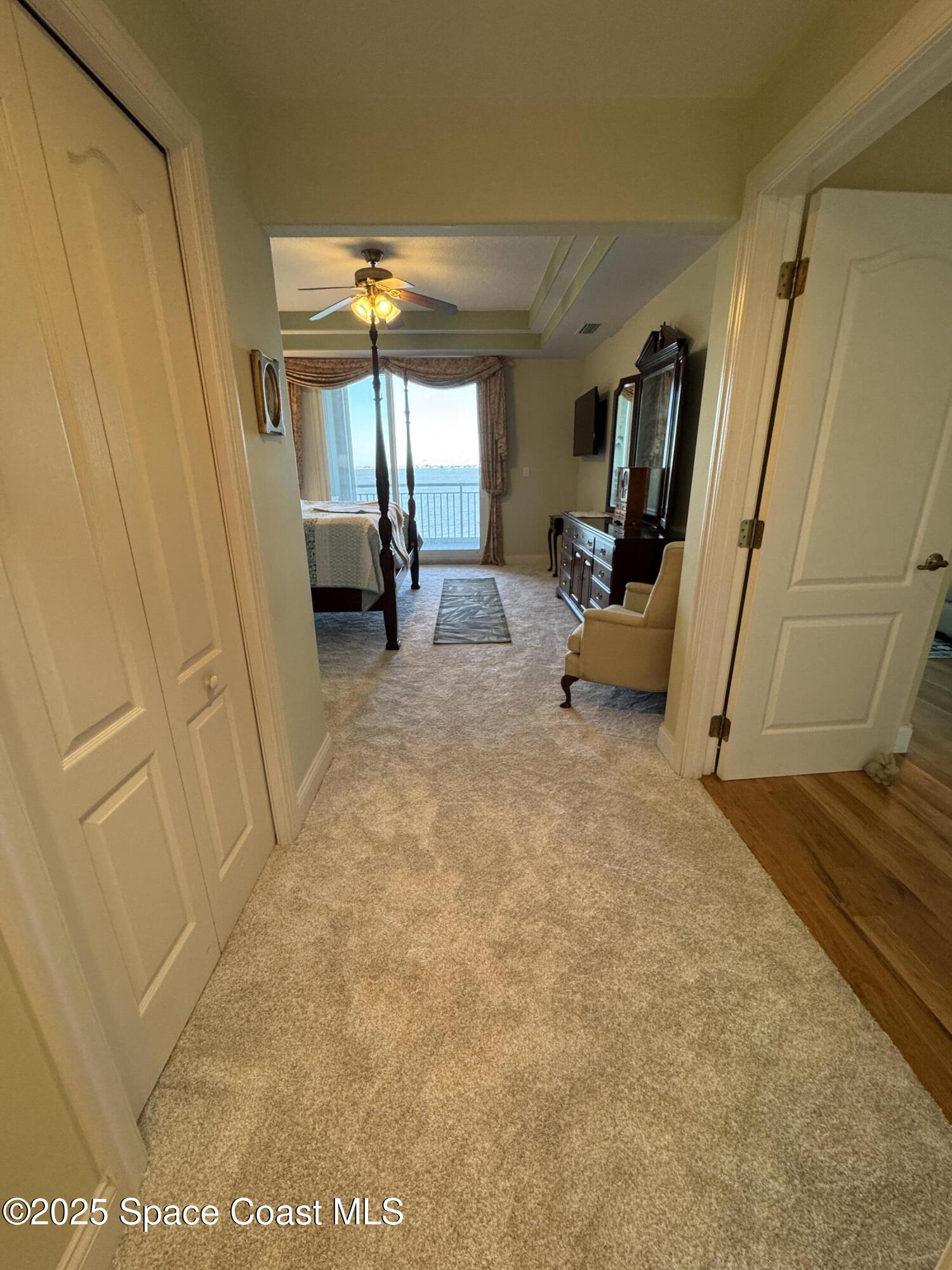 4955 Dixie Highway Northeast, Unit 502 Palm Bay, FL 32905 - Photo 30 of 51 a bed room with furniture and a window