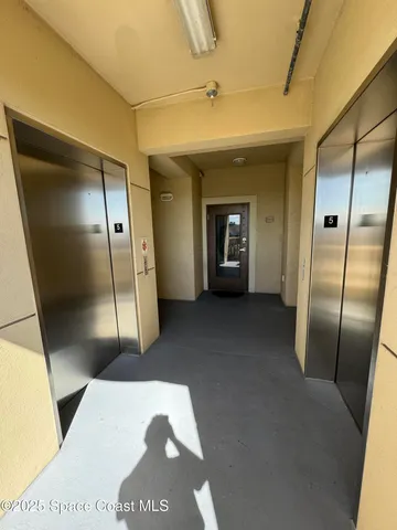 a very nice looking room with a large mirror and a furniture