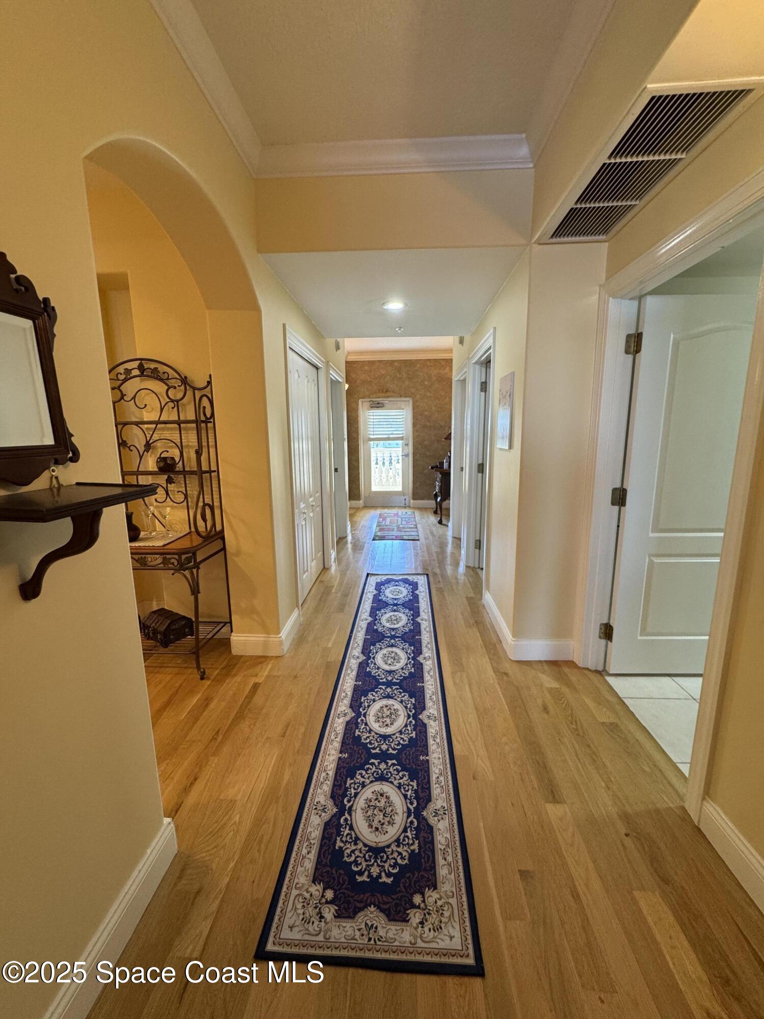 4955 Dixie Highway Northeast, Unit 502 Palm Bay, FL 32905 - Photo 31 of 51 a view of a hallway with a workspace