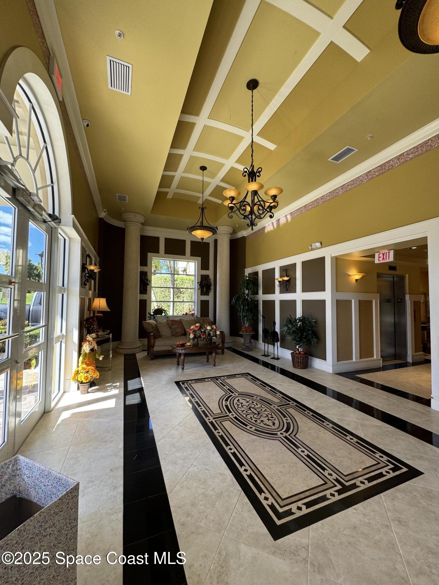 4955 Dixie Highway Northeast, Unit 502 Palm Bay, FL 32905 - Photo 39 of 51 a view of a patio with chairs and tables
